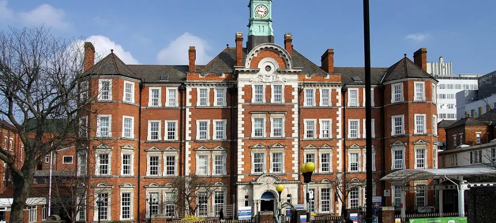The main entrance to Hammersmith Hospital on Du Cane Road, White City, London.
